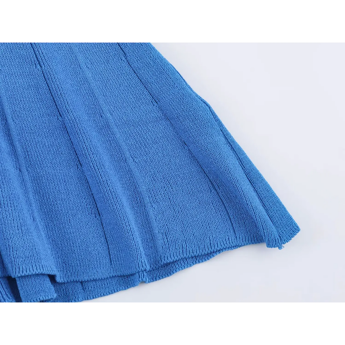 Close-up of ribbed flared skirt hem