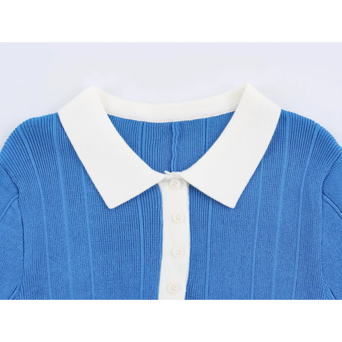Close-up of contrast collar and button placket