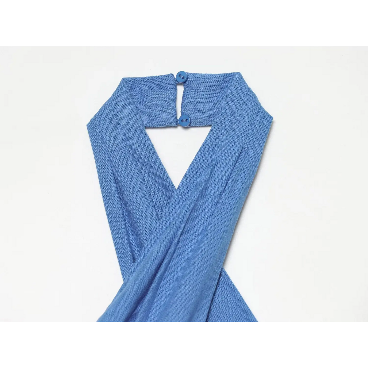 Close-up of blue back neck button and halter strap