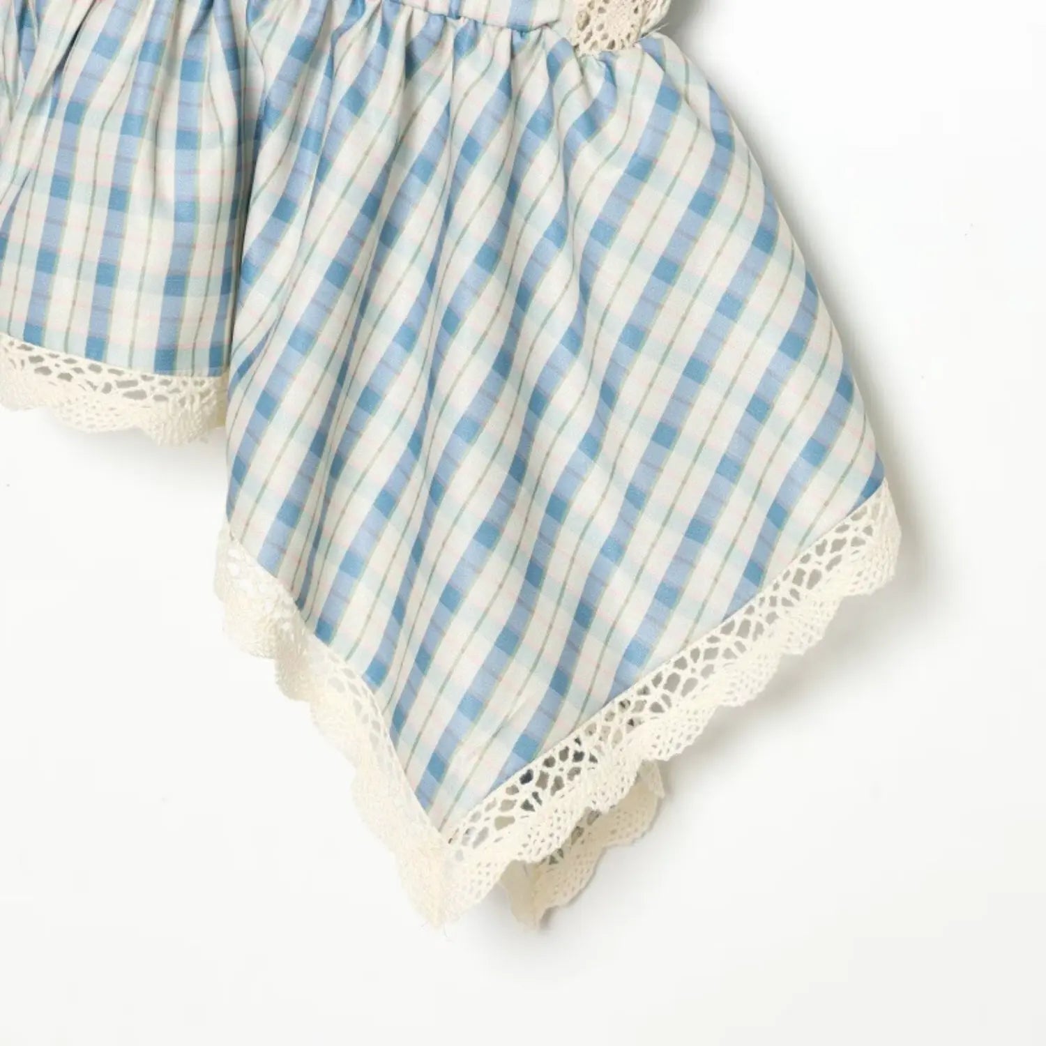 Flat fabric shot of blue off-white check lightweight woven gingham textile