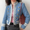 Model wearing blue lace trim cropped military jacket with gold decorative buttons, street style outfit