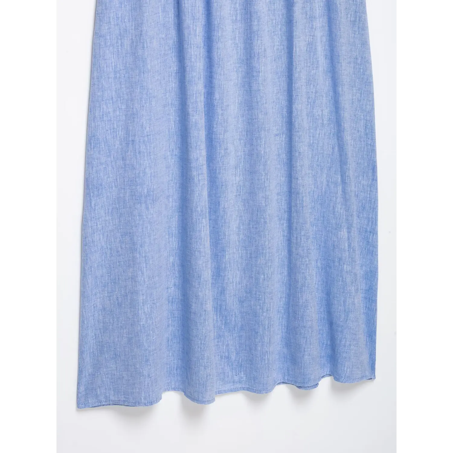 Full skirt hem view blue linen maxi dress, natural linen texture and neat finished bottom hem