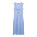 Flat lay front view blue linen sleeveless maxi dress, v‑neck tie with wooden bead tassel detail
