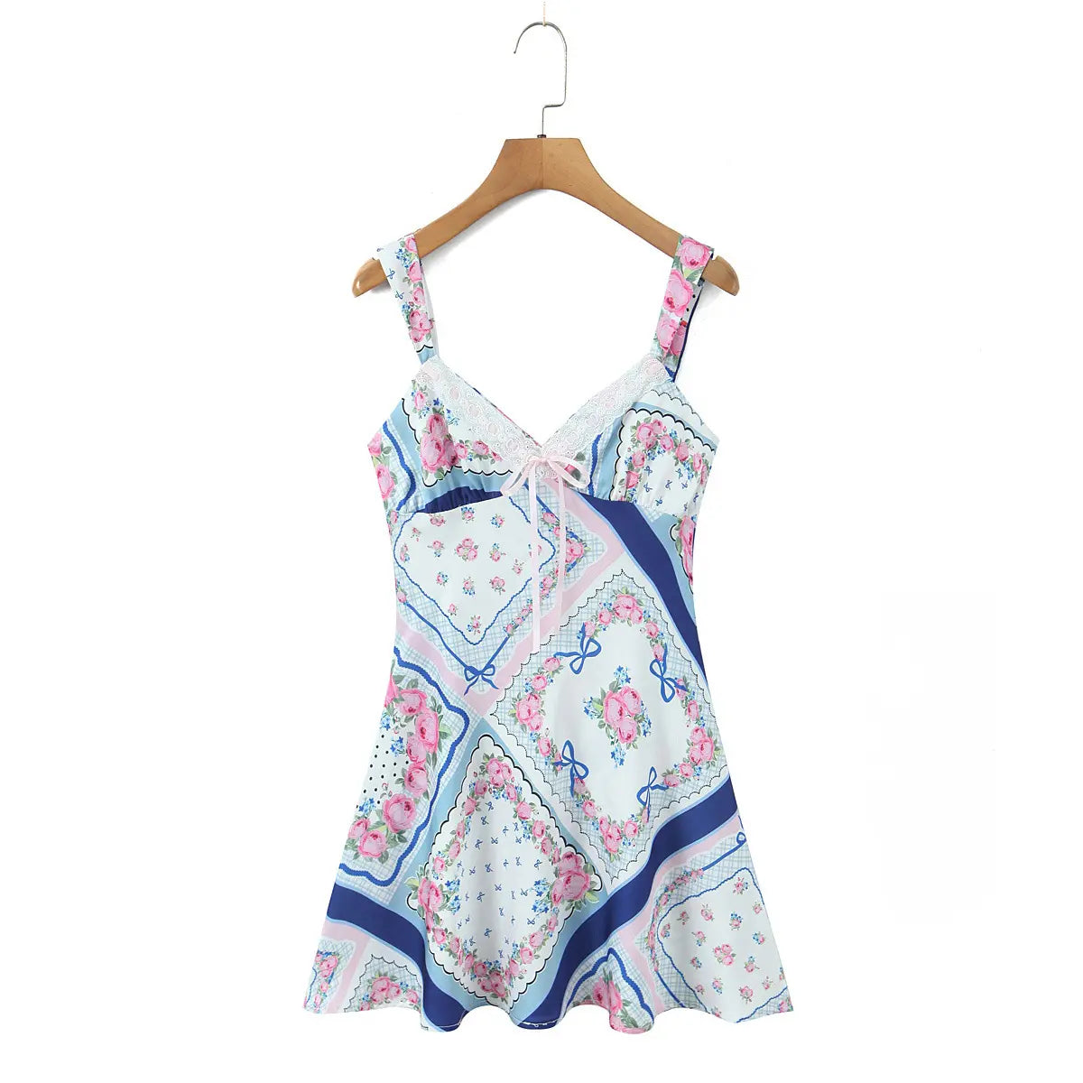 Full front view of the blue and pink floral scarf print dress on a wooden hanger.