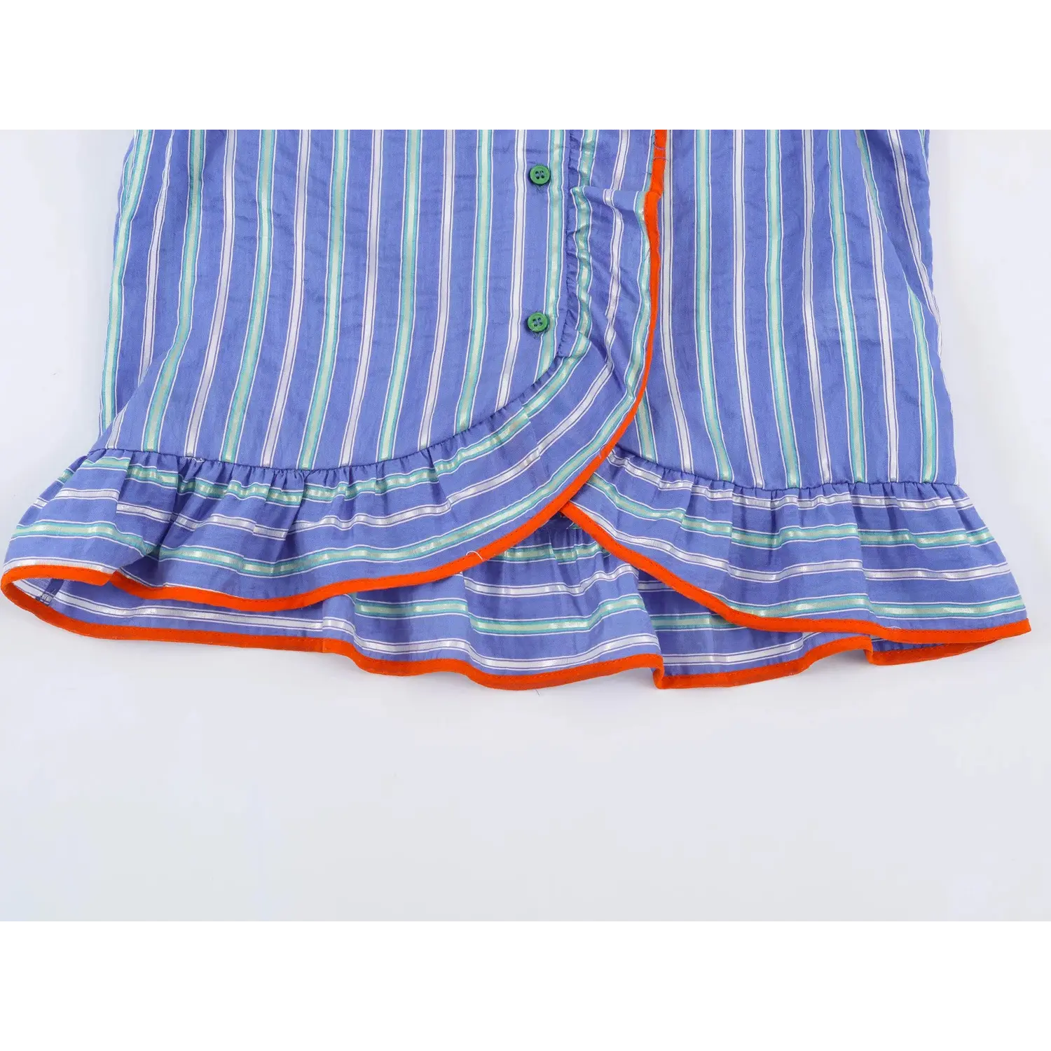 Lower front placket & peplum hem close-up, green round buttons, orange contrast piping, layered ruffle hem, vertical stripe lightweight fabric