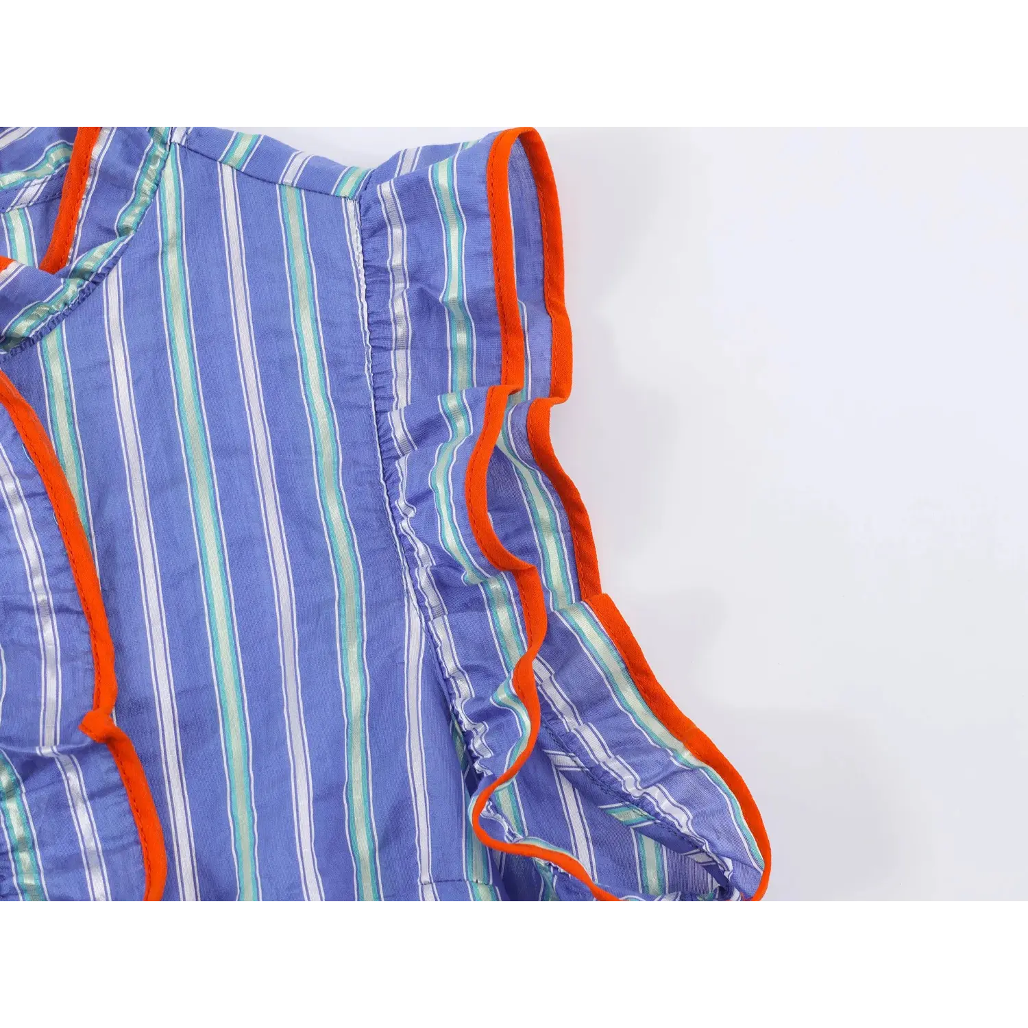 Bottom front placket & double ruffle hem close-up, orange piping binding, vertical stripe crinkle fabric, layered peplum hem structure