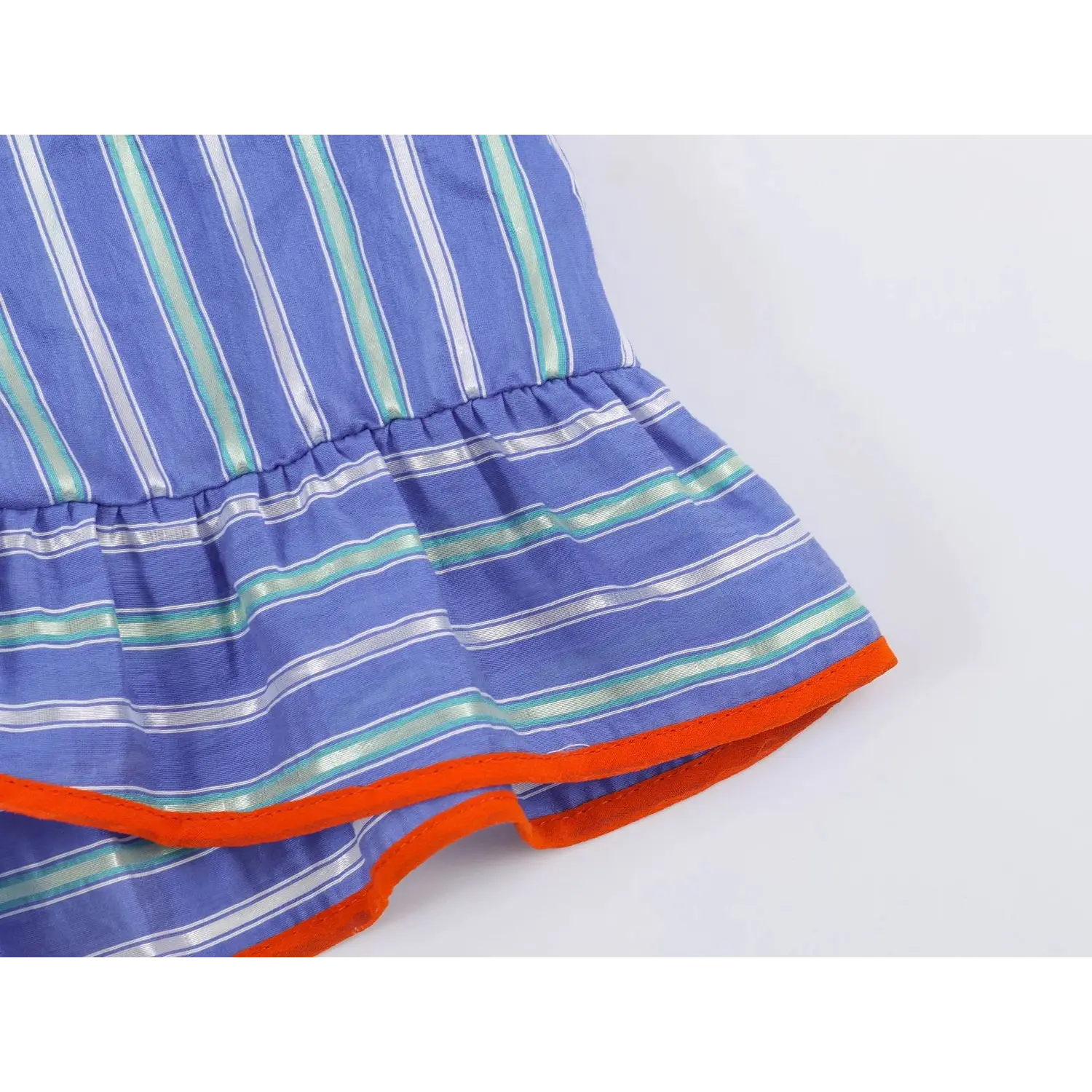 Bottom peplum ruffle hem macro texture, double layer woven fabric, full orange edge piping, vertical stripe crinkle surface