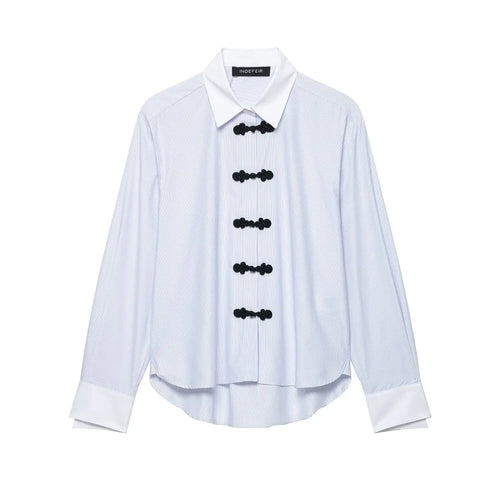 Studio white background full front shot of blue white vertical stripe long sleeve shirt, contrast white collar & cuffs, front black chinese frog knot buttons, curved hem relaxed fit