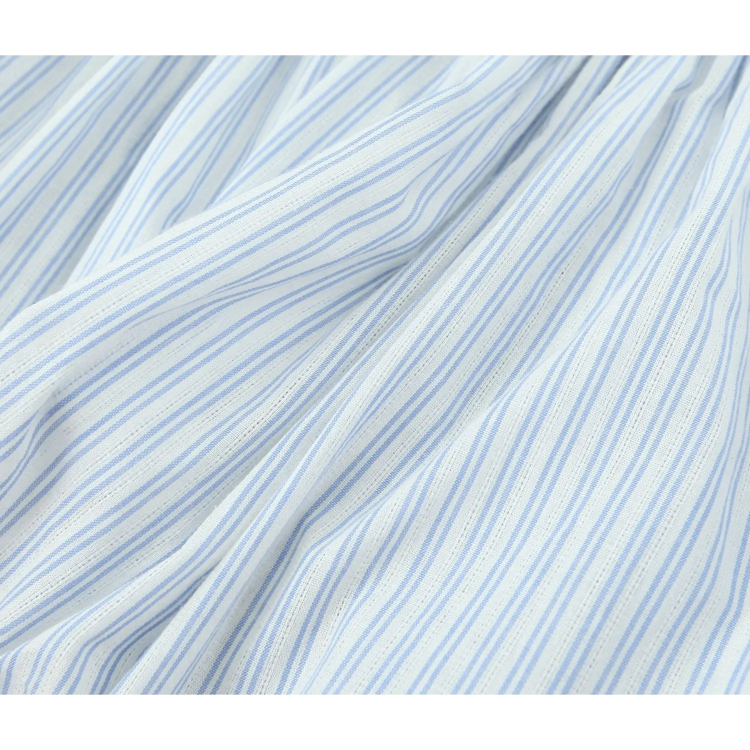 Macro fabric texture shot, lightweight woven blue‑white vertical stripe material with natural soft folds
