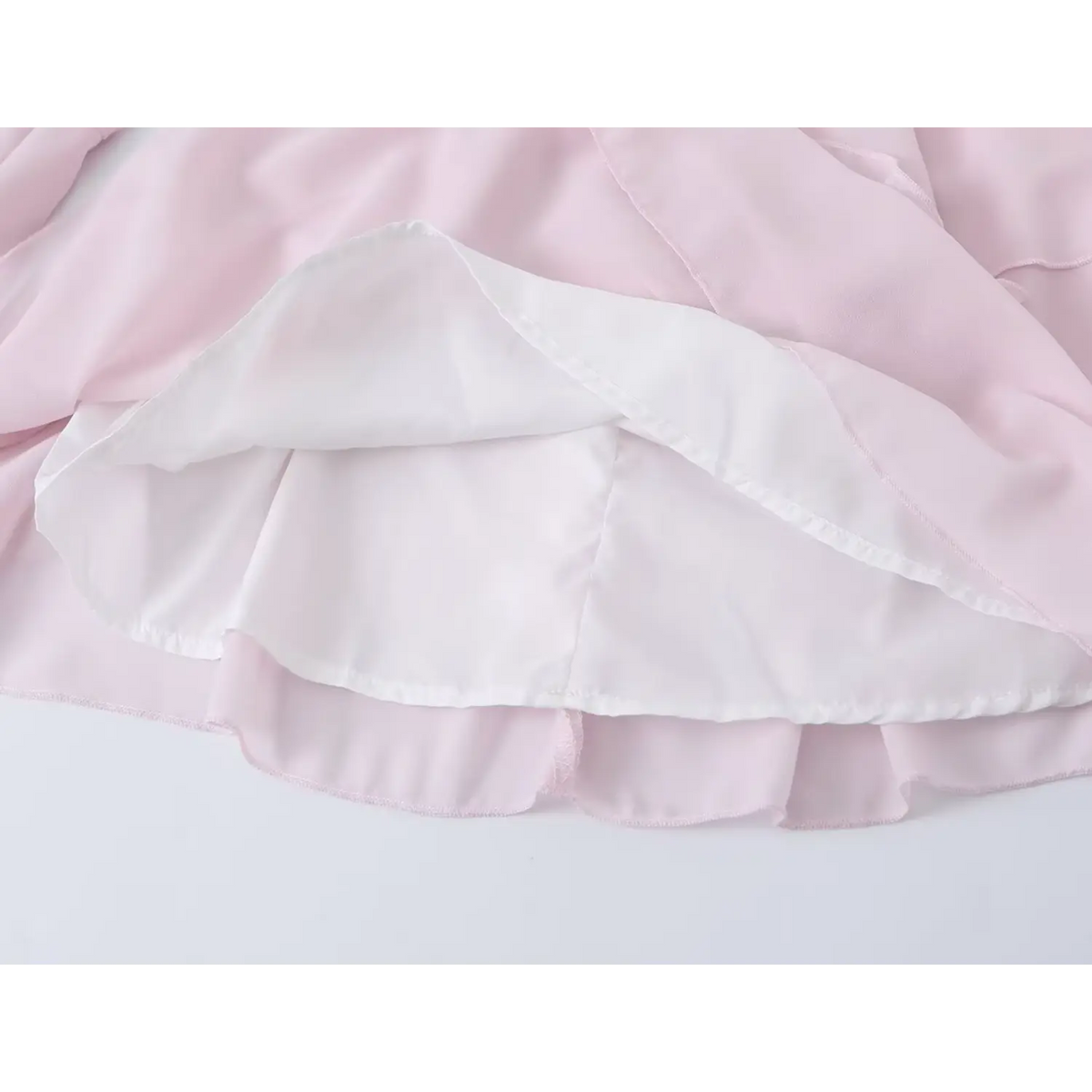 Close-up of white lining inside skirt