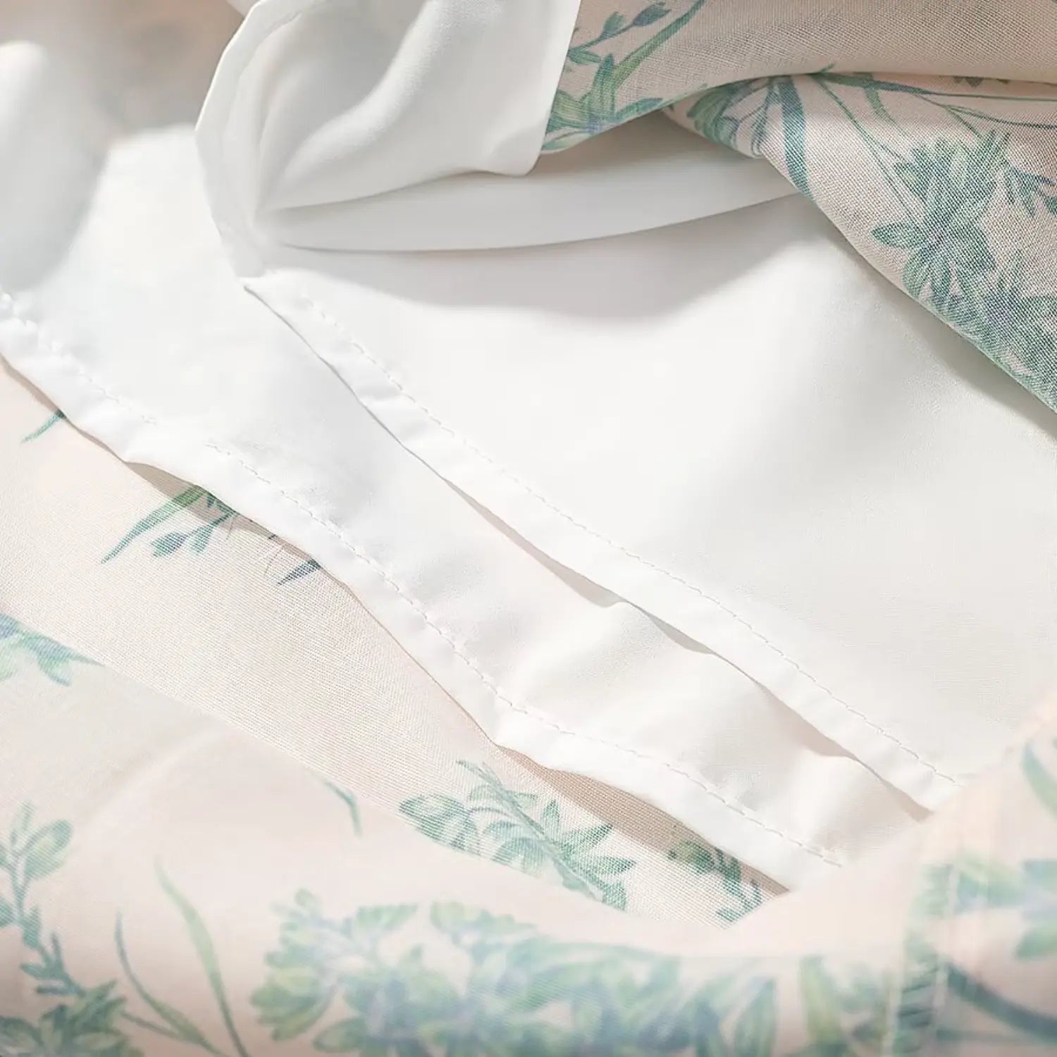 Close‑up shot of smooth white inner lining fabric and neat seam workmanship