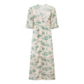 Flat lay front view blush green floral midi dress white lace v‑neck puff short ruffle sleeve front button placket