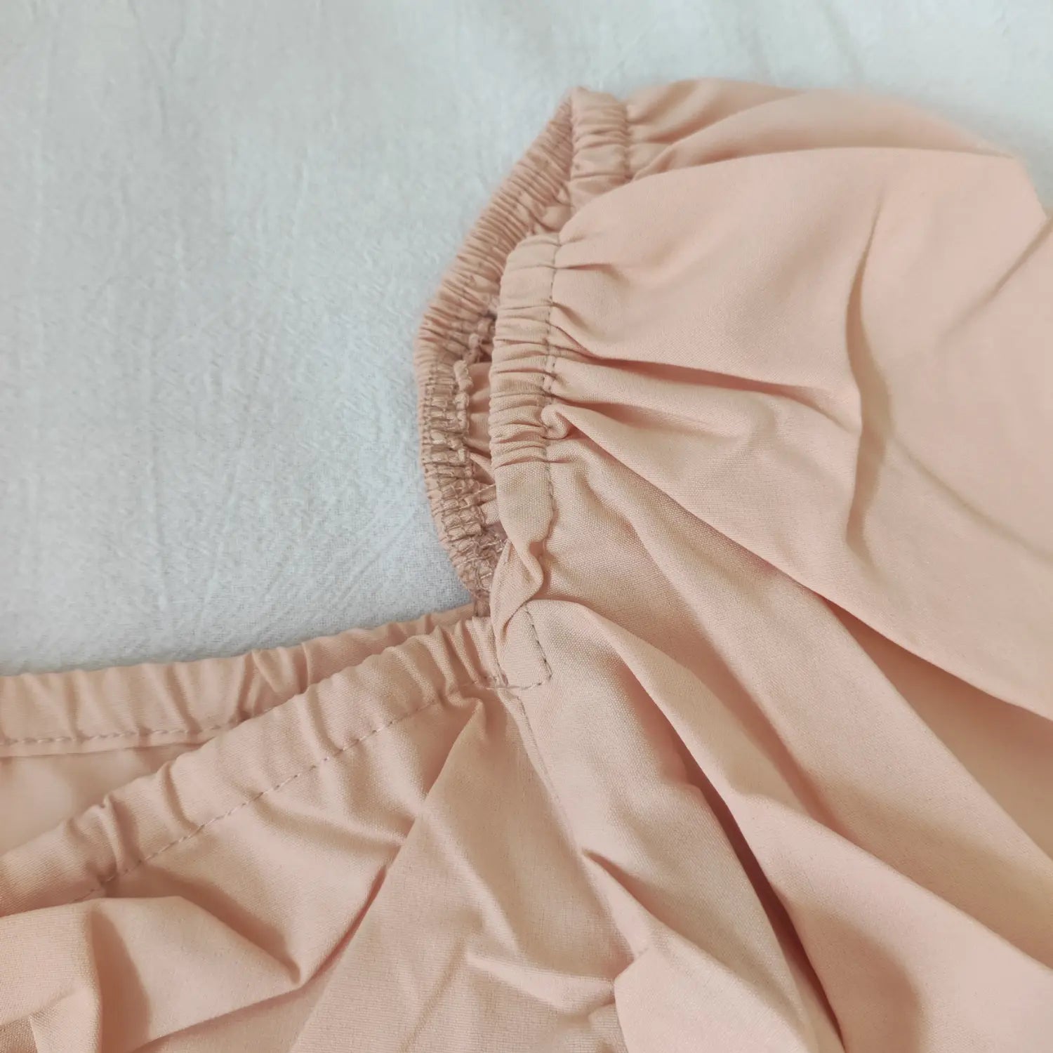 shoulder-elastic-detail-view | Close up elastic gathered puff shoulder detail blush pink square neck top