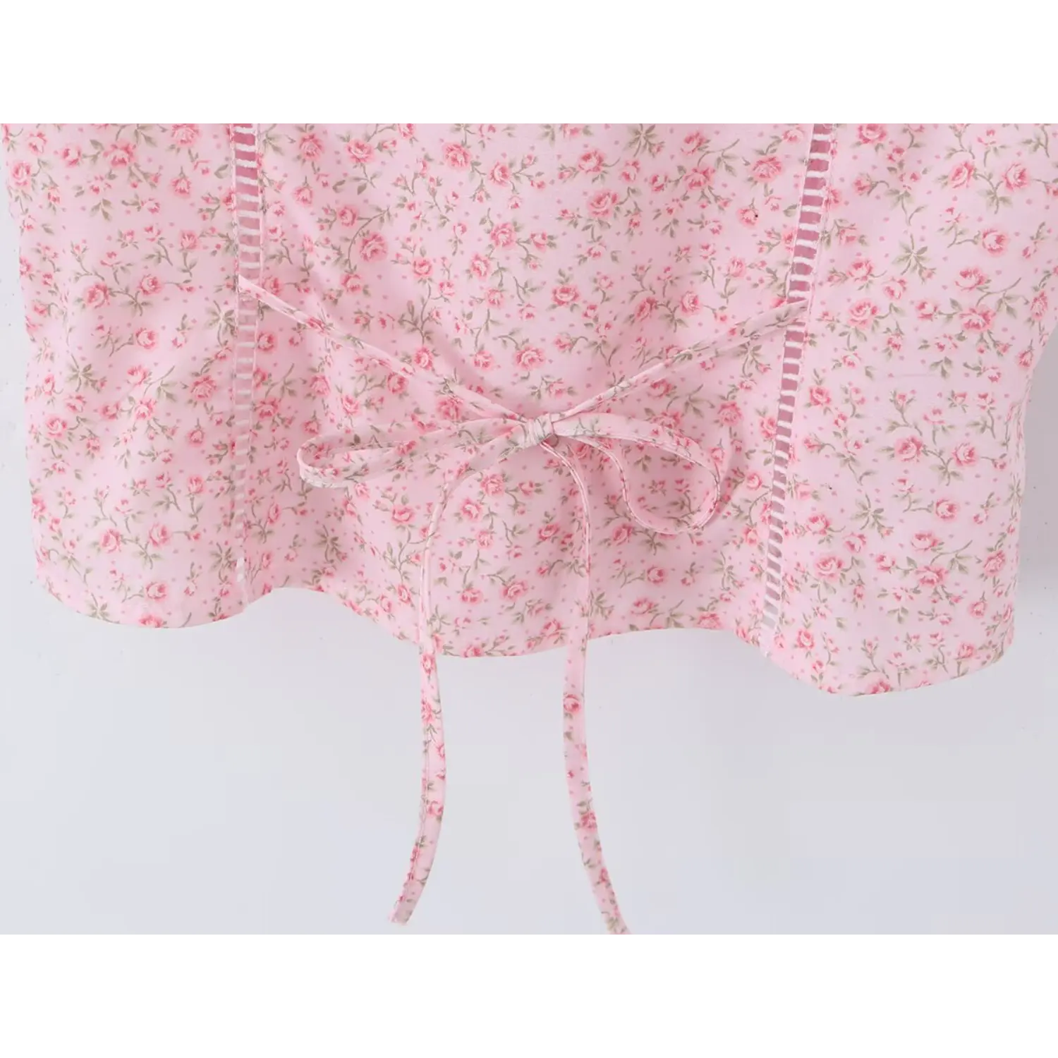 Back waist closeup, adjustable self fabric tie bow for fit shaping