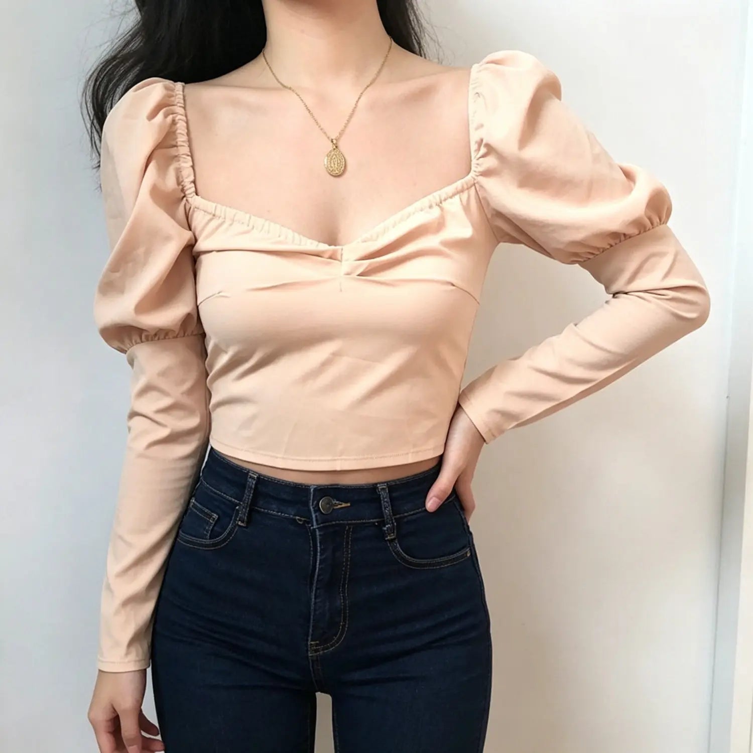 model-front-view | Model wearing blush pink square neck puff long sleeve ruched front cropped blouse