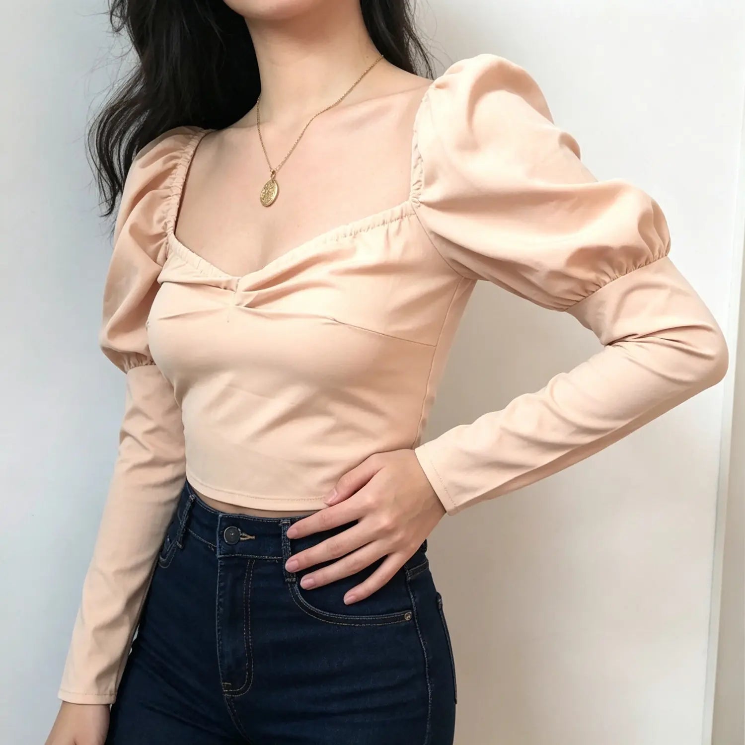 model-side-view | Side shot model blush pink sweetheart square neck puff sleeve fitted cropped top