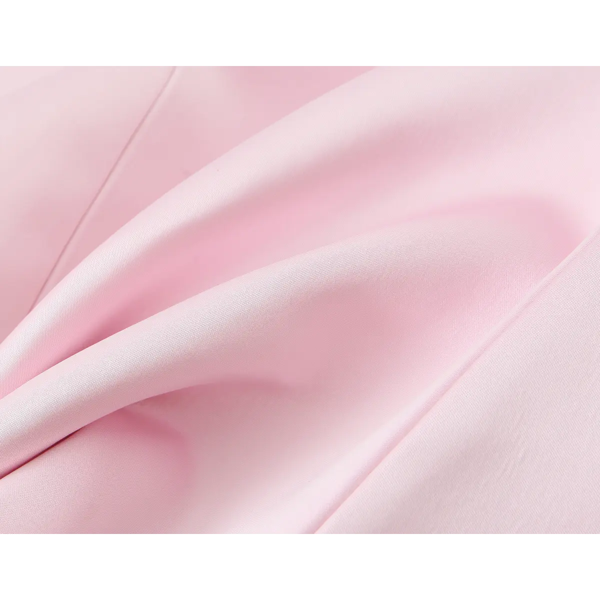 Close-up detail shot of the blush pink satin fabric on a mini dress, showing the smooth, lustrous texture and soft drape.
