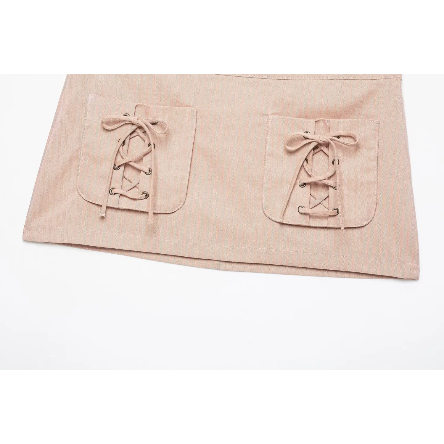 Partial shot front pockets lace‑up eyelet tie detail blush pink striped mini skirt