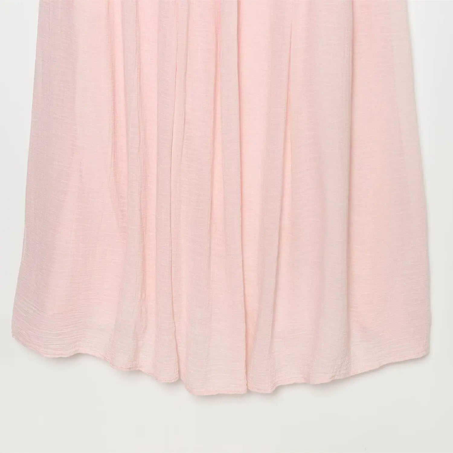 Partial view of loose flowy maxi skirt fabric