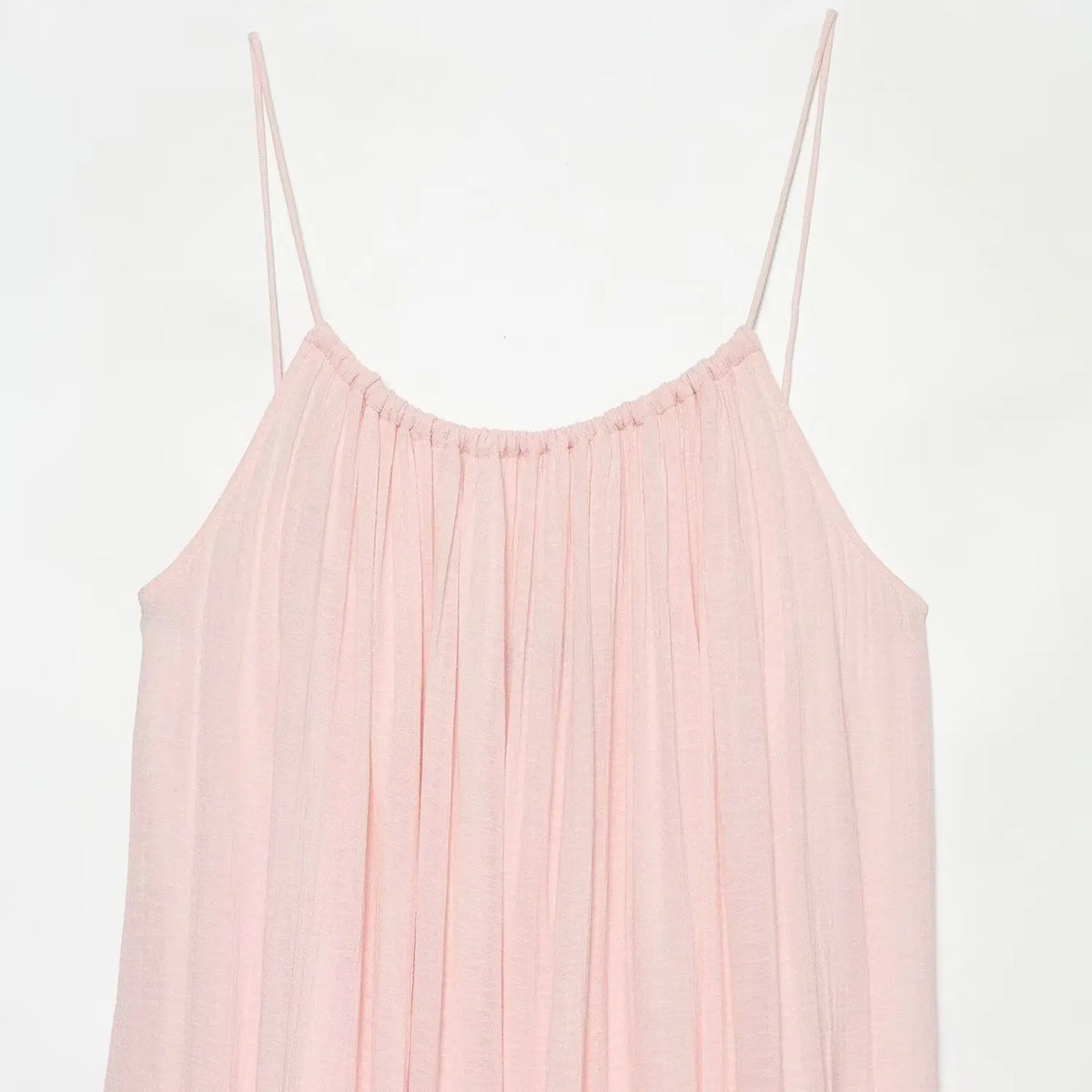 Close‑up of scoop neckline and gathered bust detail