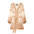 Front flat lay of cream boho paisley print mini dress, v‑neck, long balloon sleeves and matching fabric tie belt