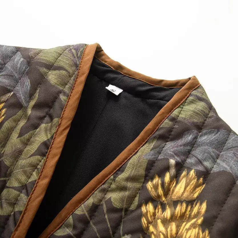 Close-up of v neck opening and brown contrast piping