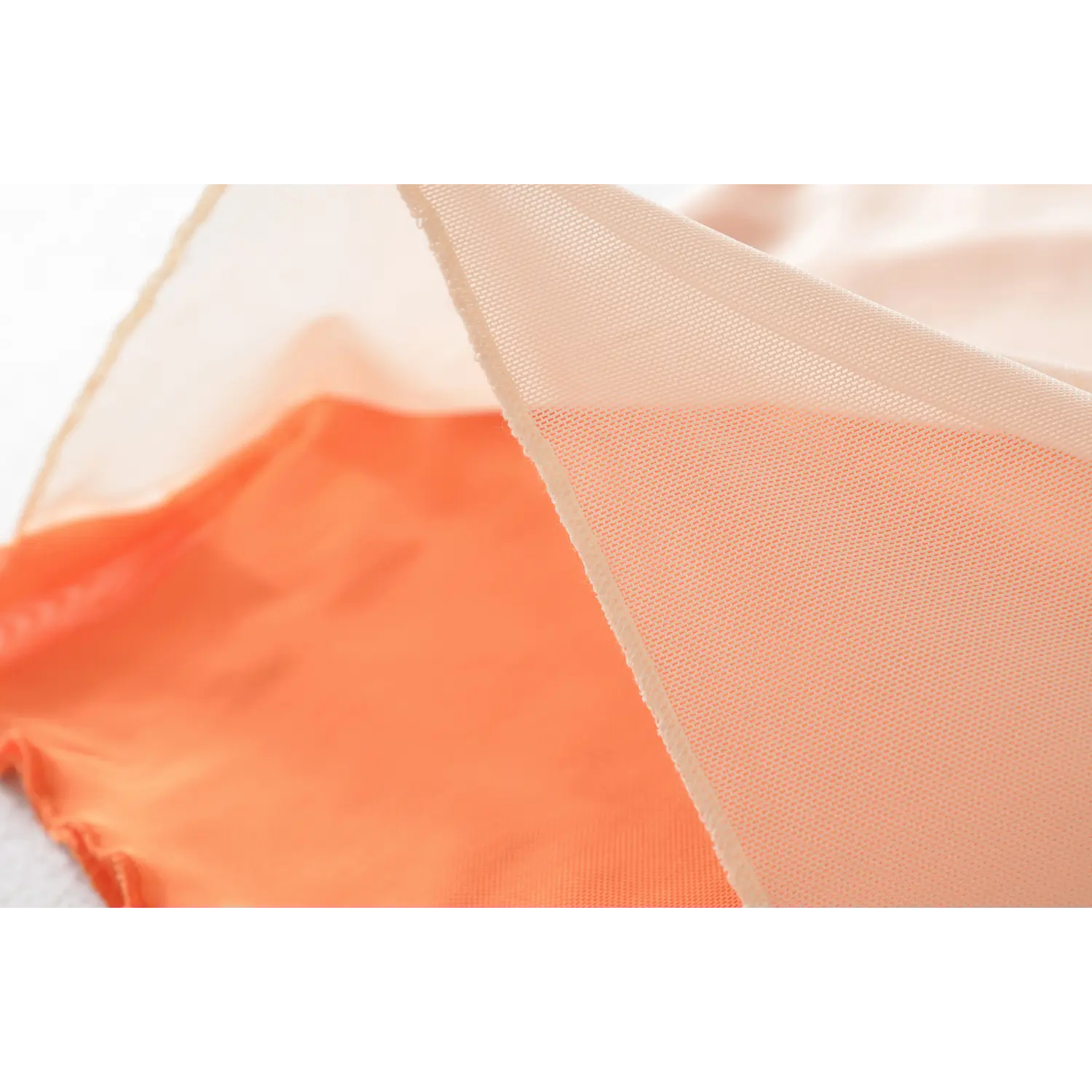 Breathable stretch mesh fabric color block flat close-up, fine breathable mesh texture double layer contrast color thin draping mesh cloth white background shot