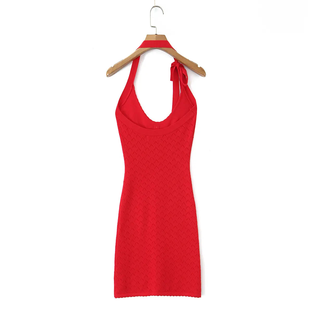 Full back white background shot of red textured knit halter bodycon dress, open U back and scalloped hemline.
