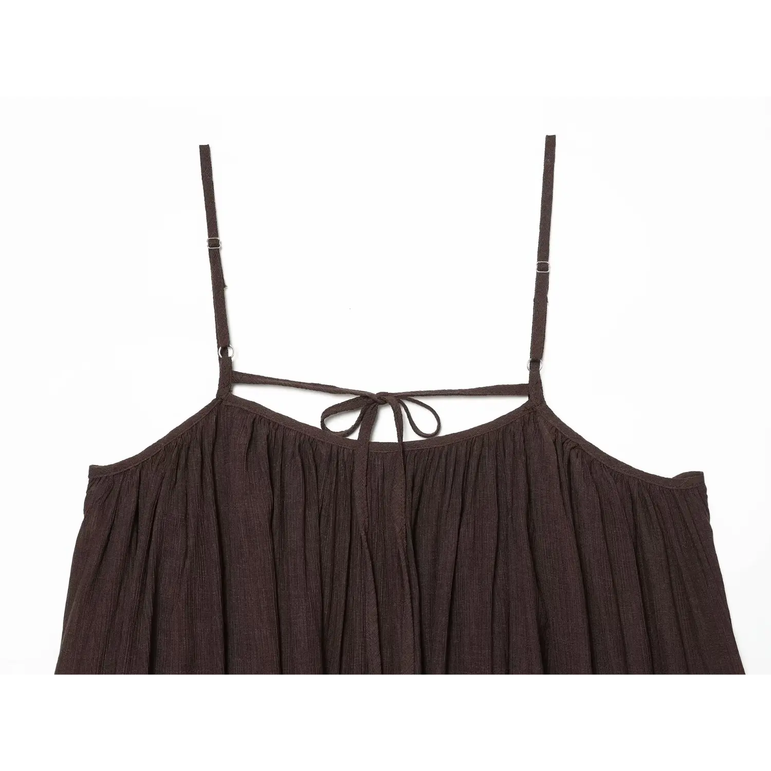 Close‑up adjustable slider spaghetti straps and back tie design for brown flowy cami dress