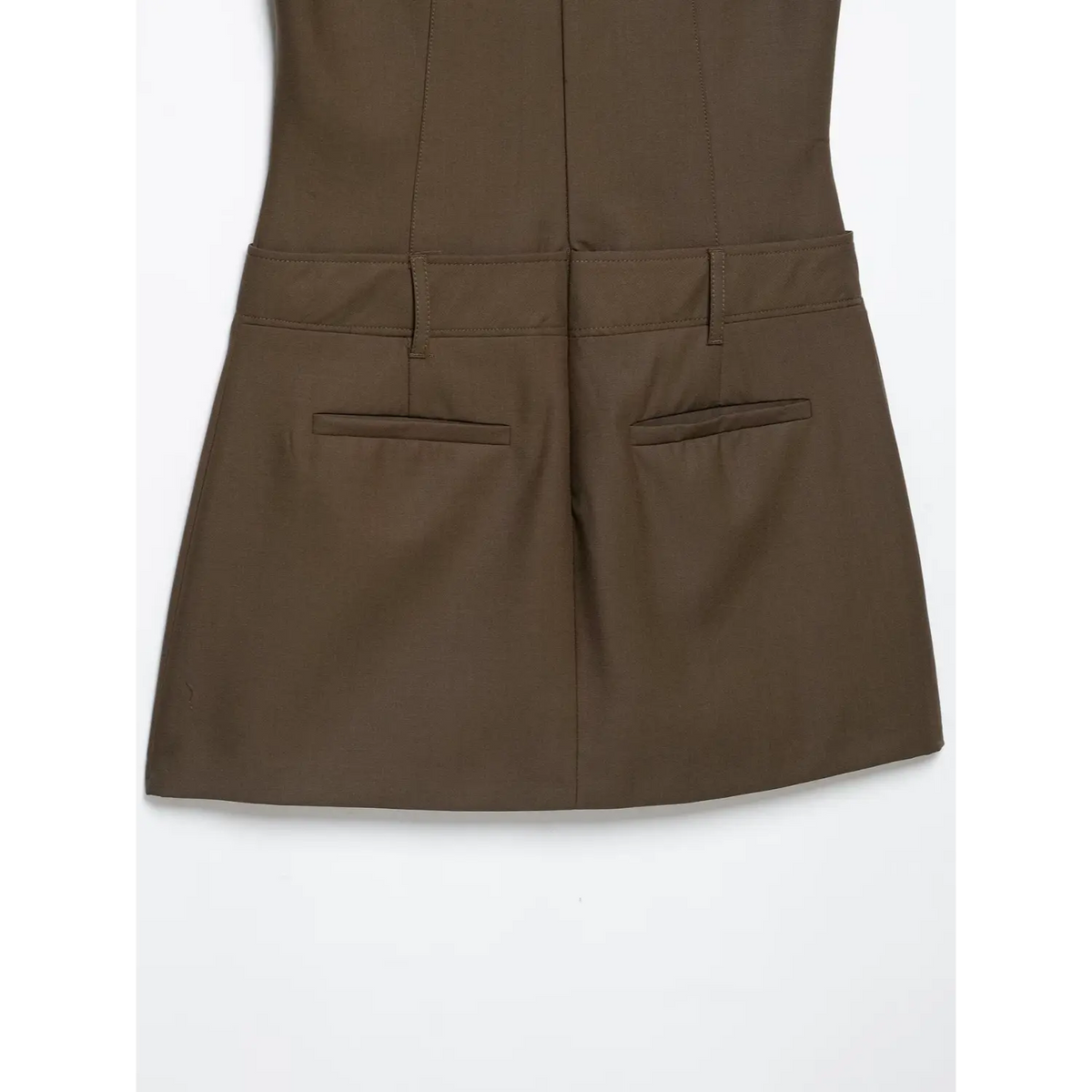 Close-up of back skirt and welt pockets
