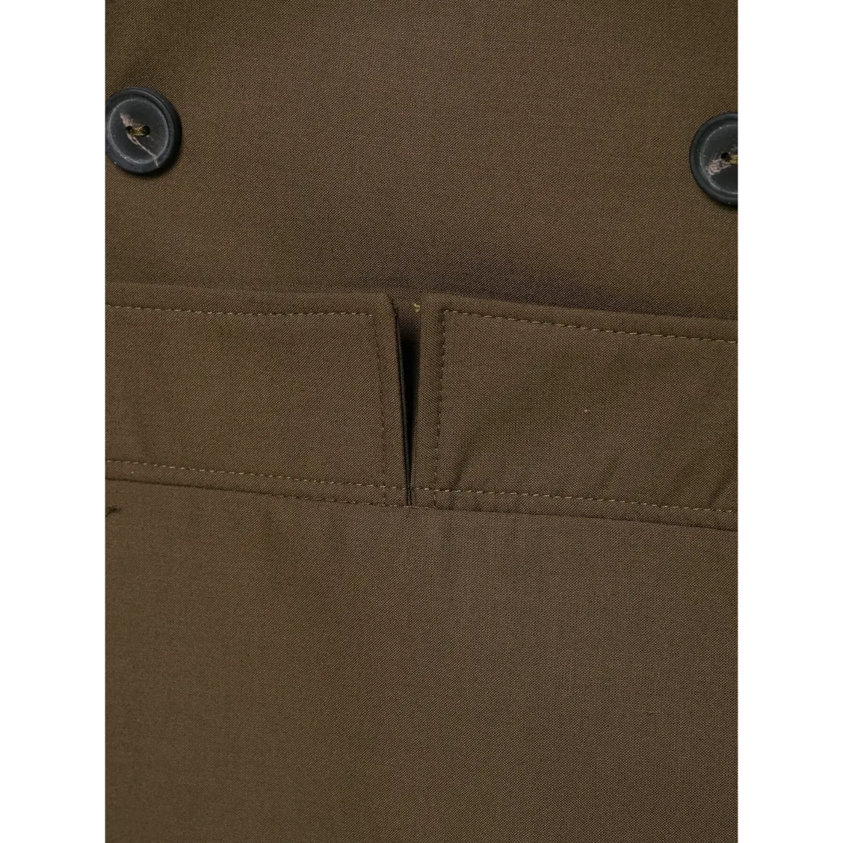 Close-up of waist tab and stitching detail