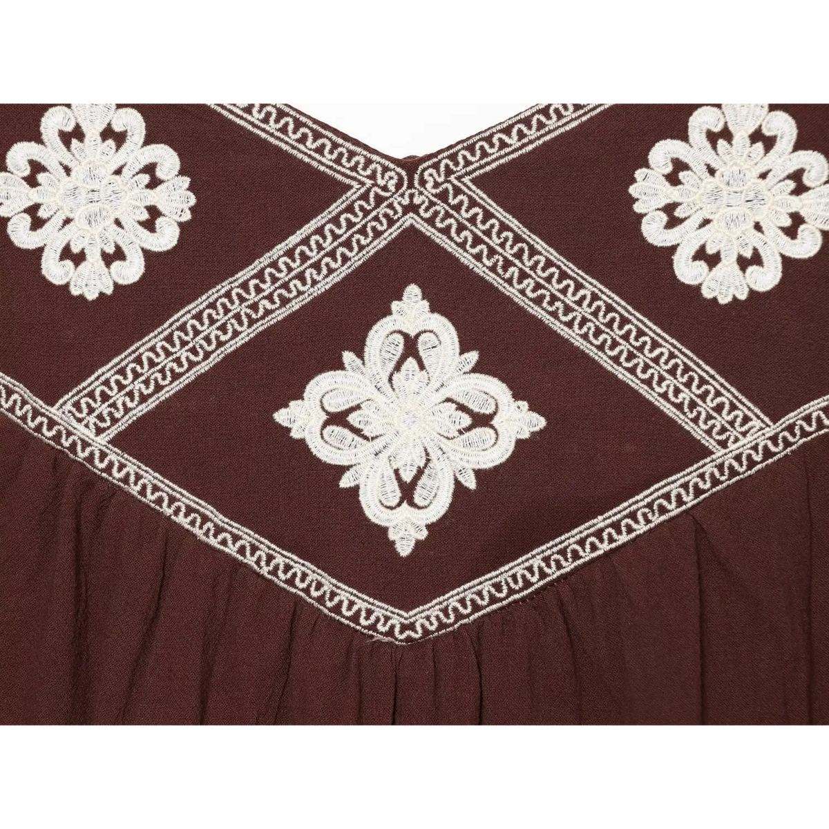 Close-up of center diamond embroidery and zigzag stitching