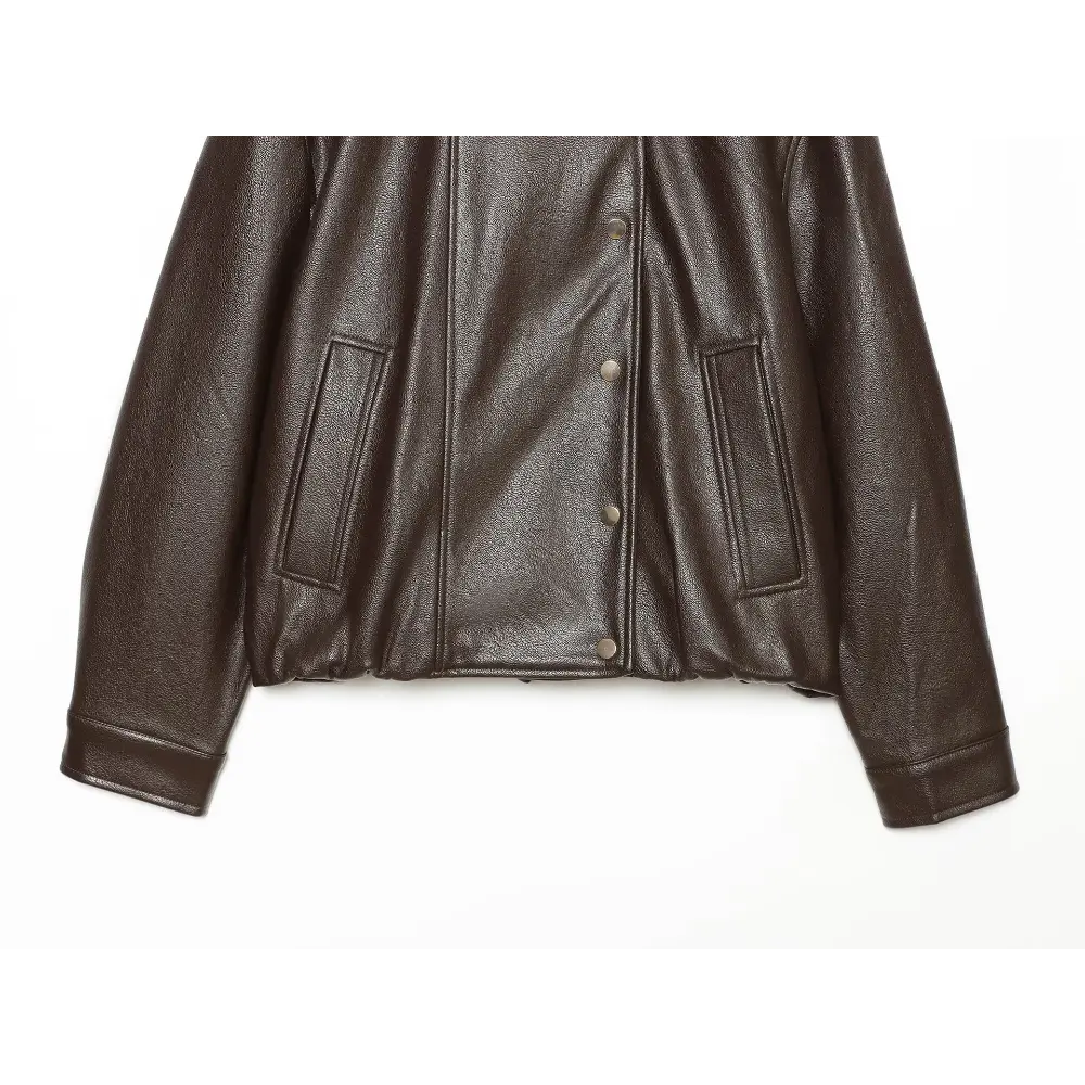 Close-up of button placket, welt pockets and cuffs flat lay