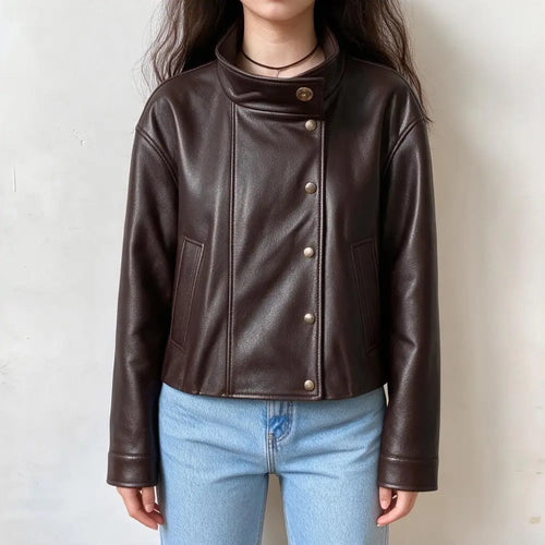 Model wearing brown faux leather stand collar button jacket, front view