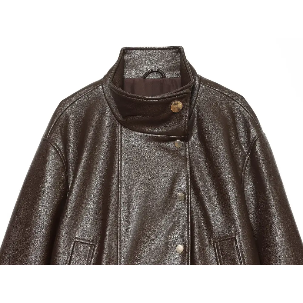 Close-up of stand collar, button placket and gold buttons