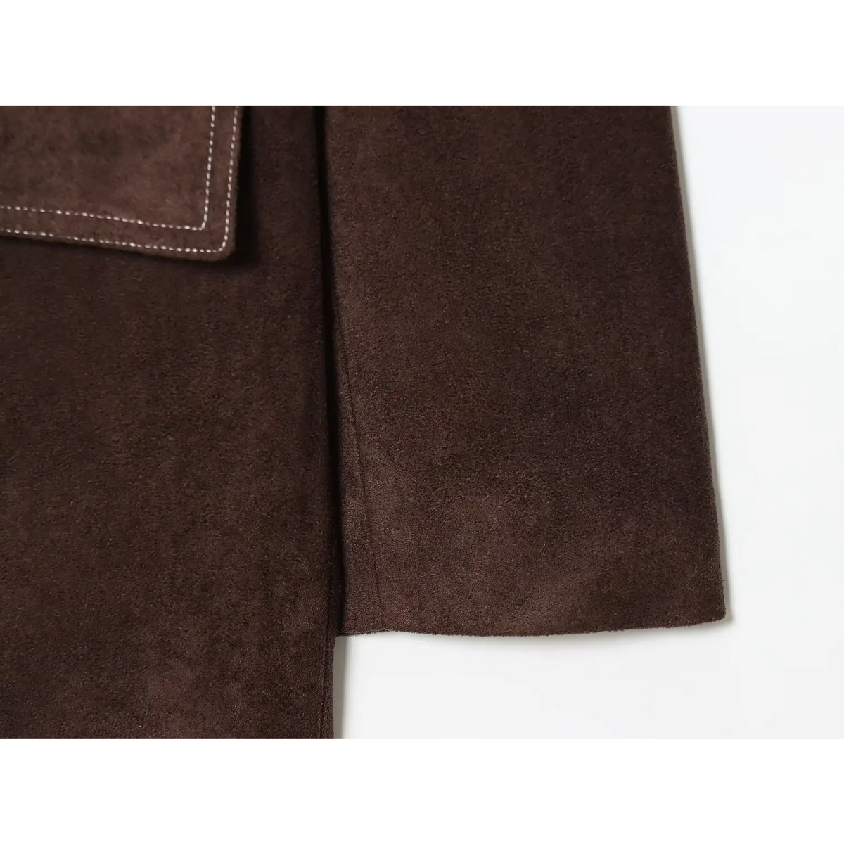 Close-up of blazer hem and side seam