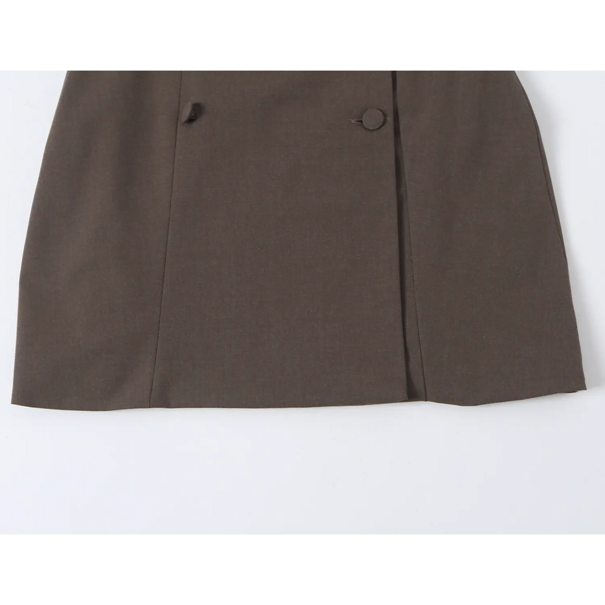 Close-up of double breasted placket and hem