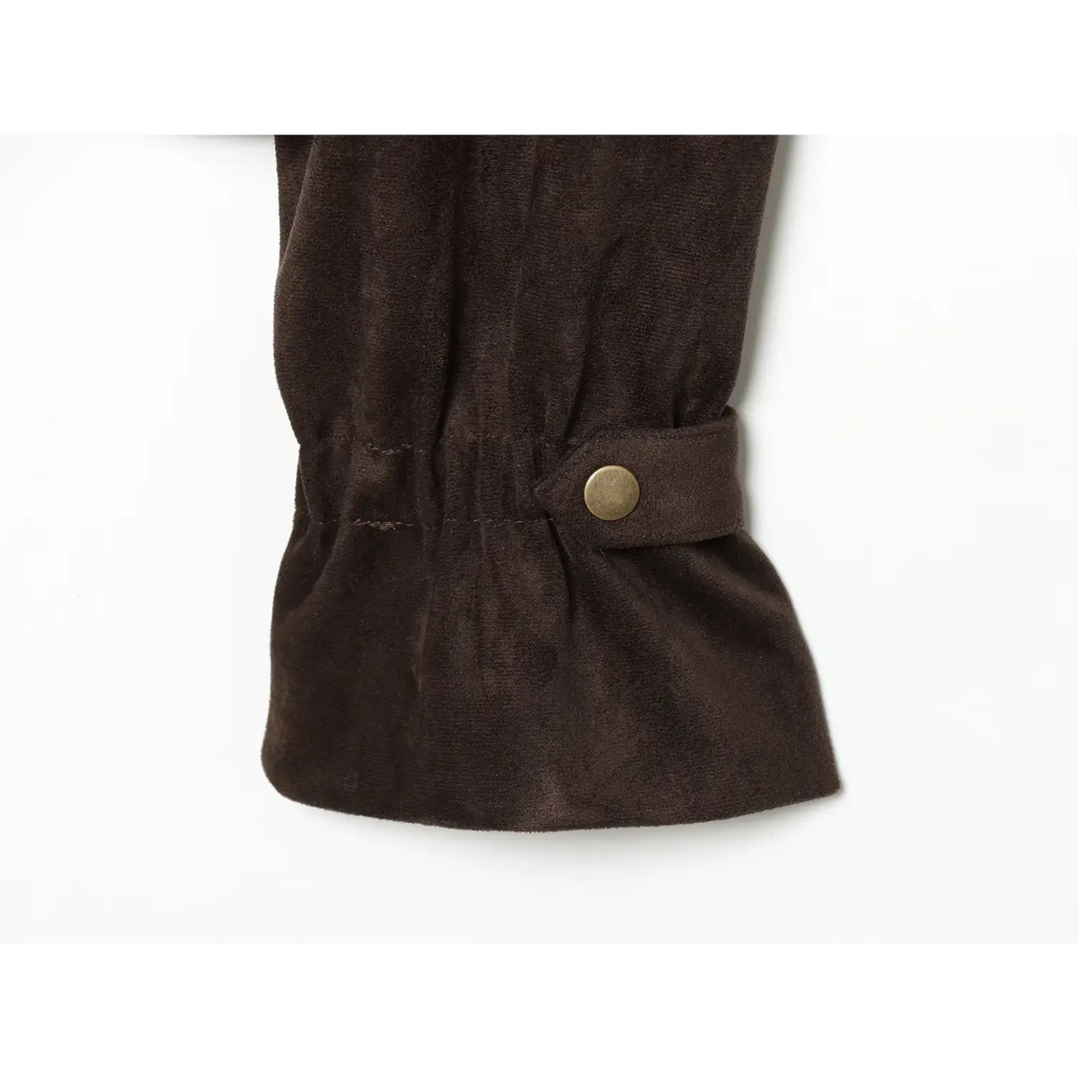 Close-up of cuff strap and brass snap button