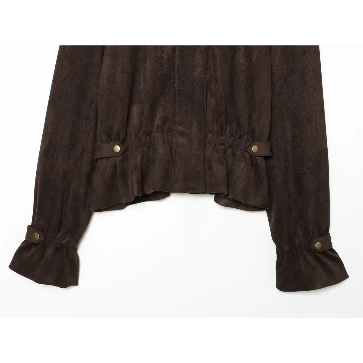 Close-up of peplum hem, strap tabs and cuff straps