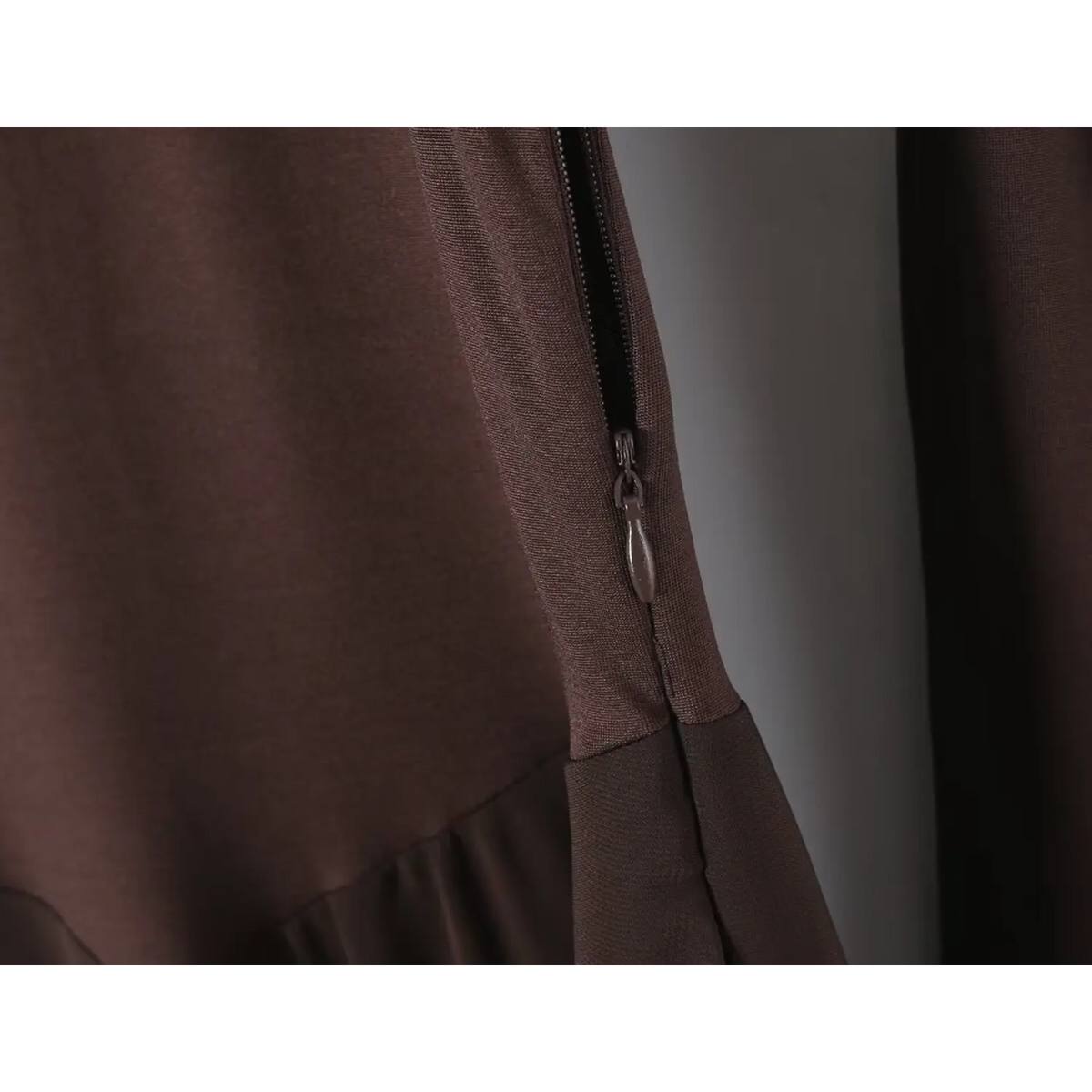 Close-up of side zipper detail