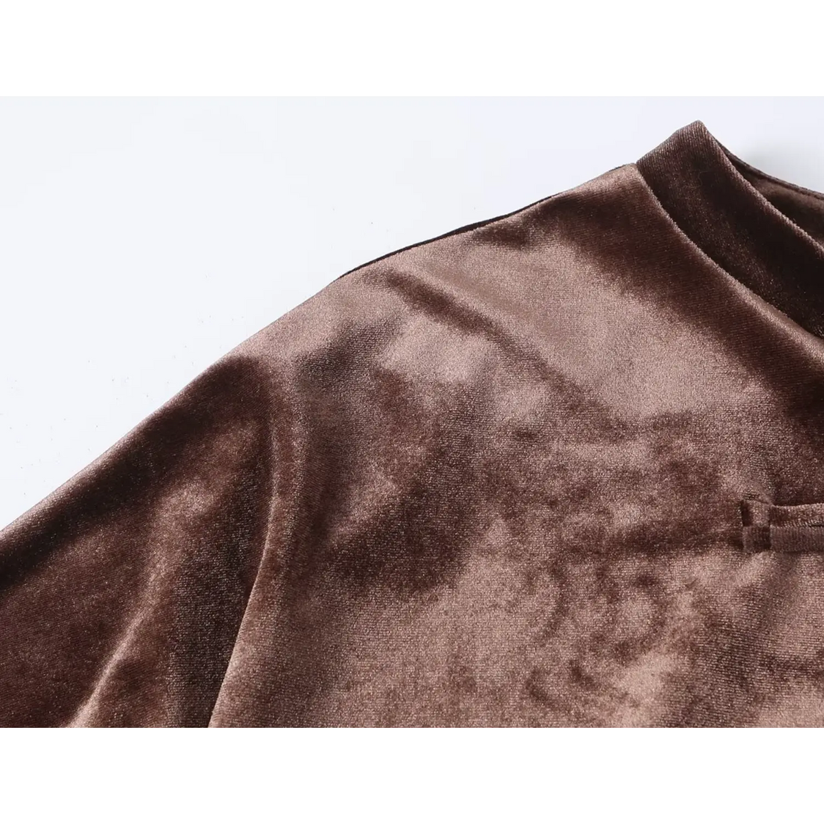 Close-up of shoulder seam and velvet texture