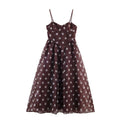 Brown maxi dress with white polka dots, front view, sweetheart bust cup, adjustable spaghetti straps, high waist, flowy long skirt