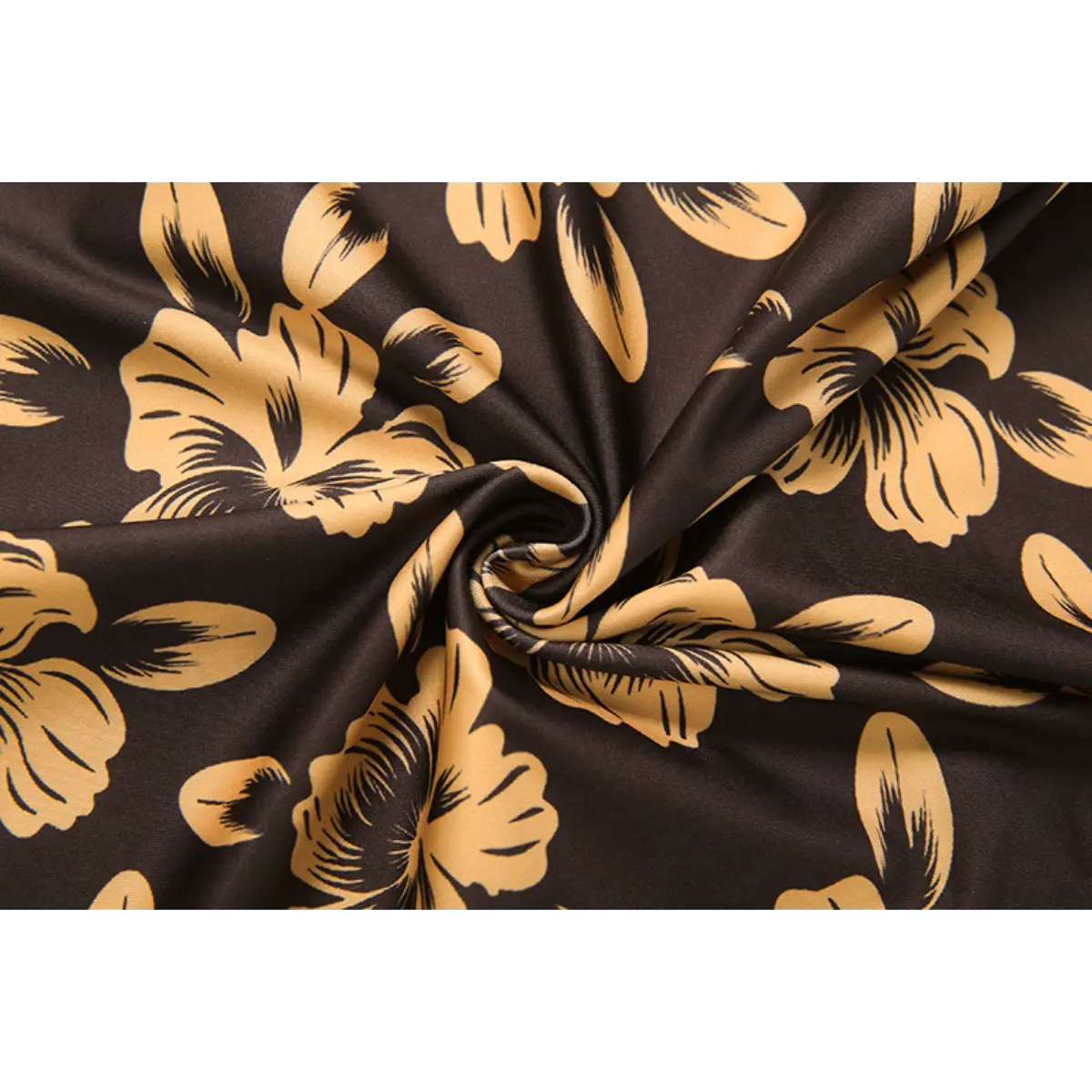 Close-up shot of the brown fabric with yellow hibiscus floral print, showing the smooth texture and print details.
