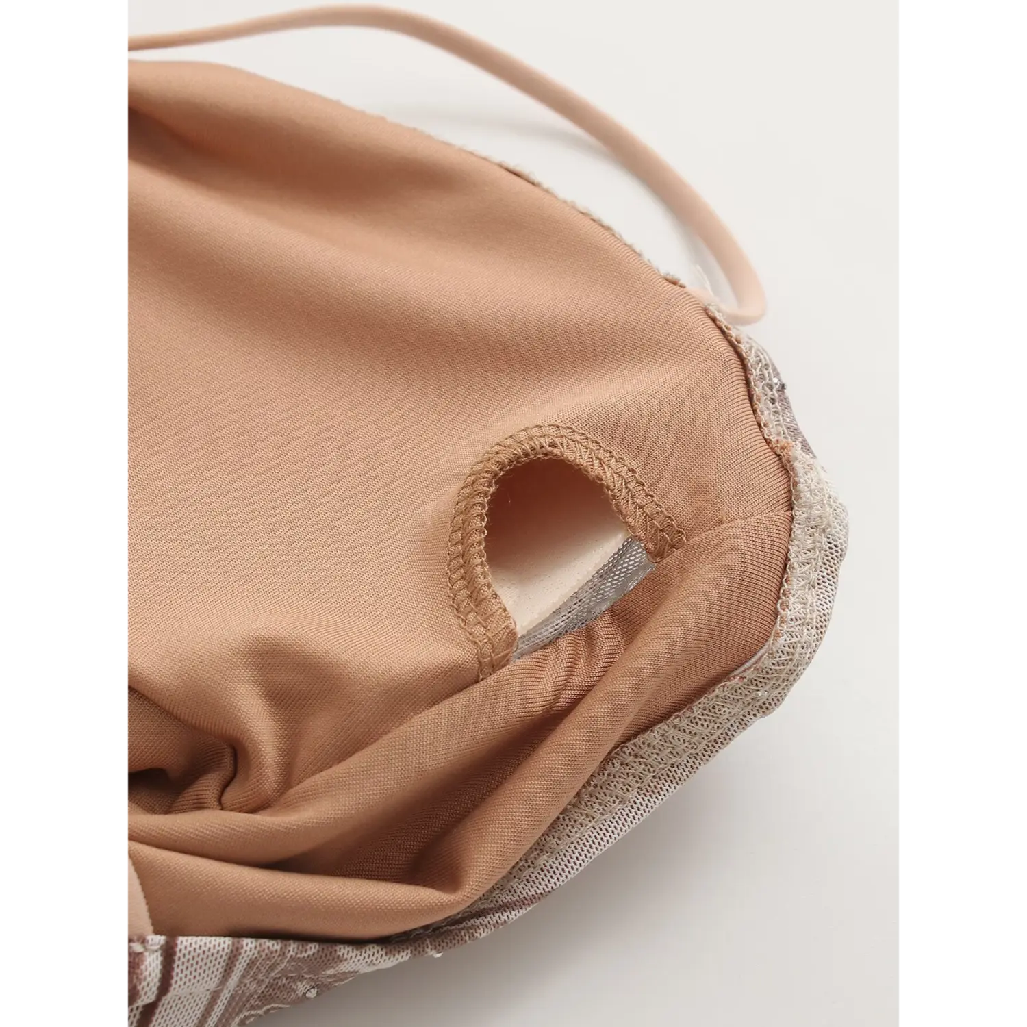 Partial close‑up of soft solid inner lining fabric