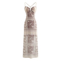 Front full view of brown paisley print cami maxi dress with crisscross thin straps