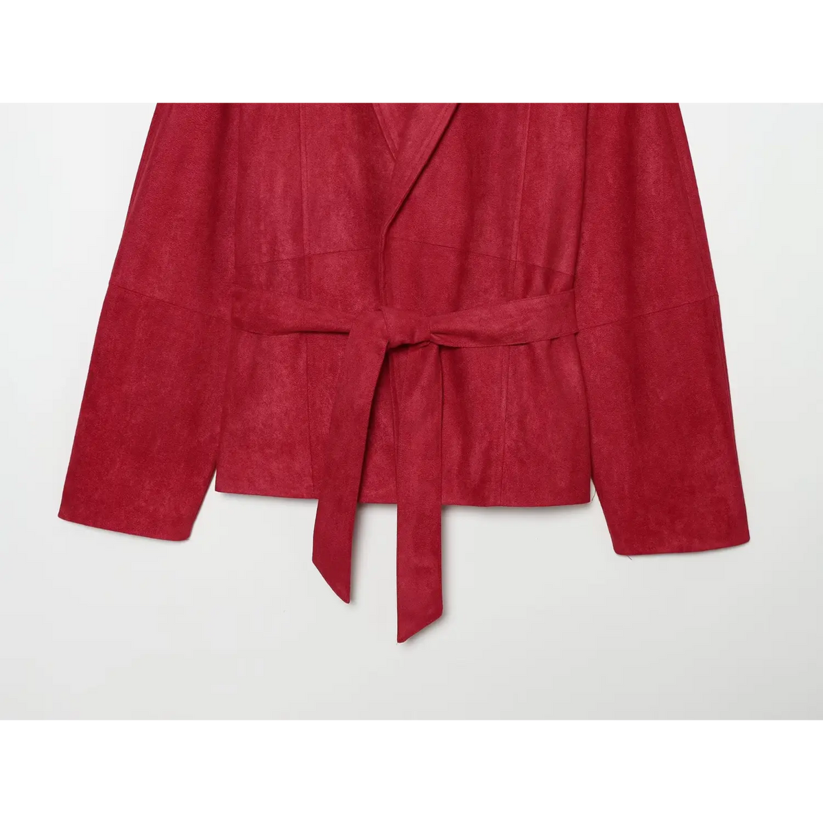 Close-up of matching belt tie at waist