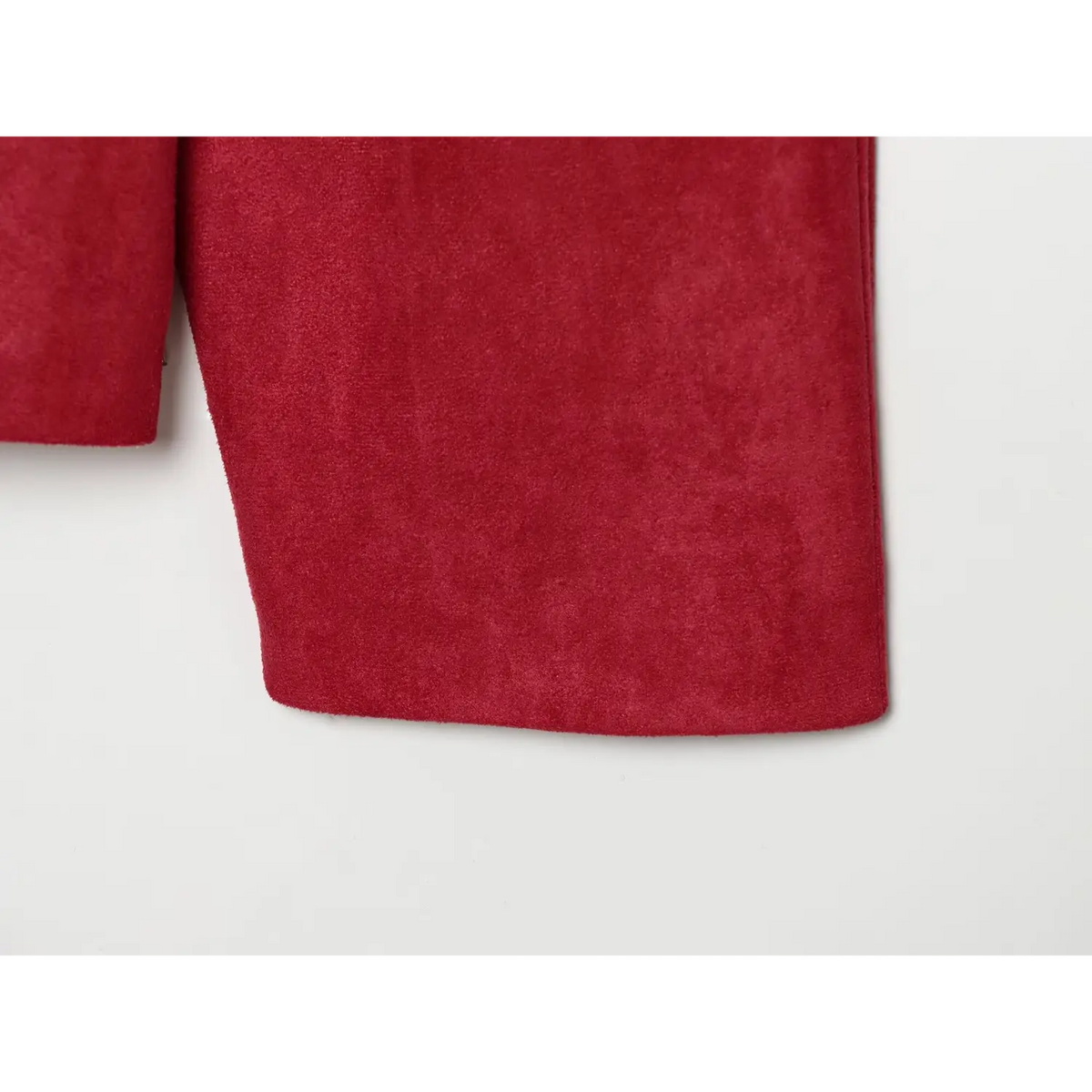 Close-up of jacket hem and sleeve cuff