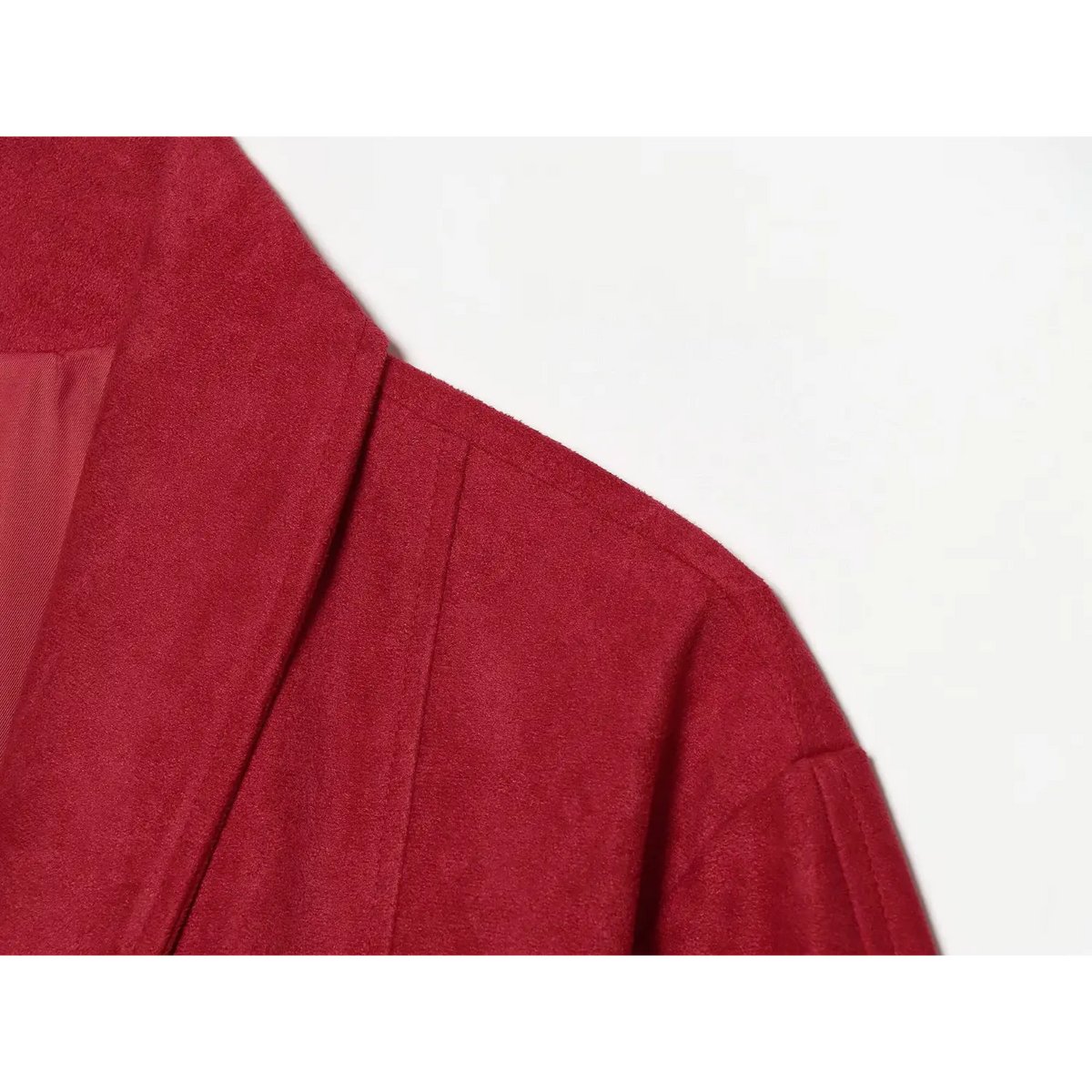 Close-up of shoulder seam and faux suede texture