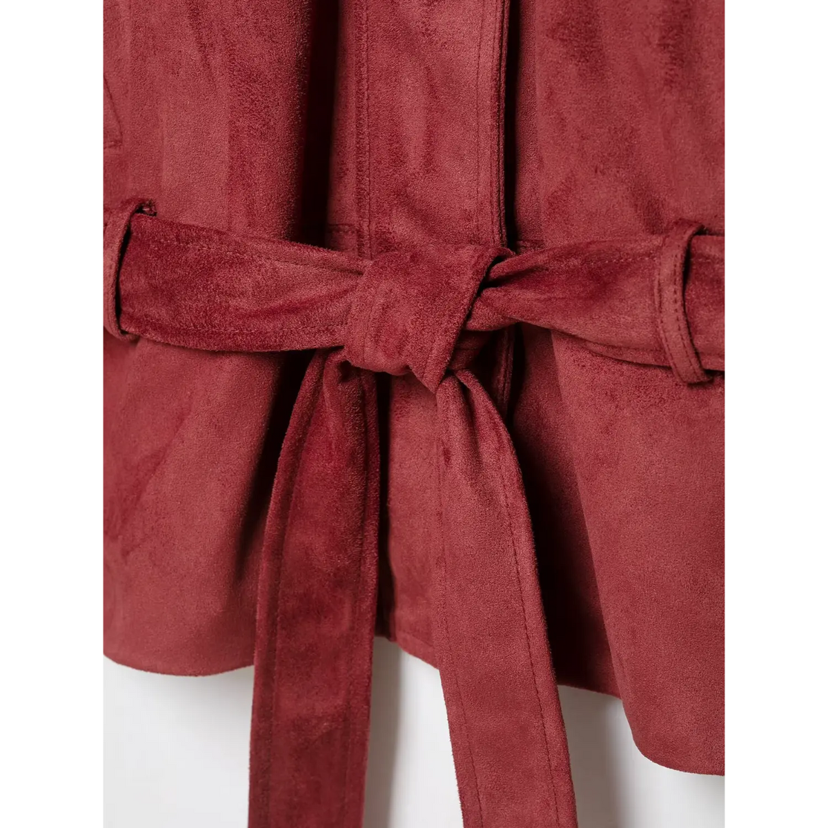 Close-up of knotted self-tie belt