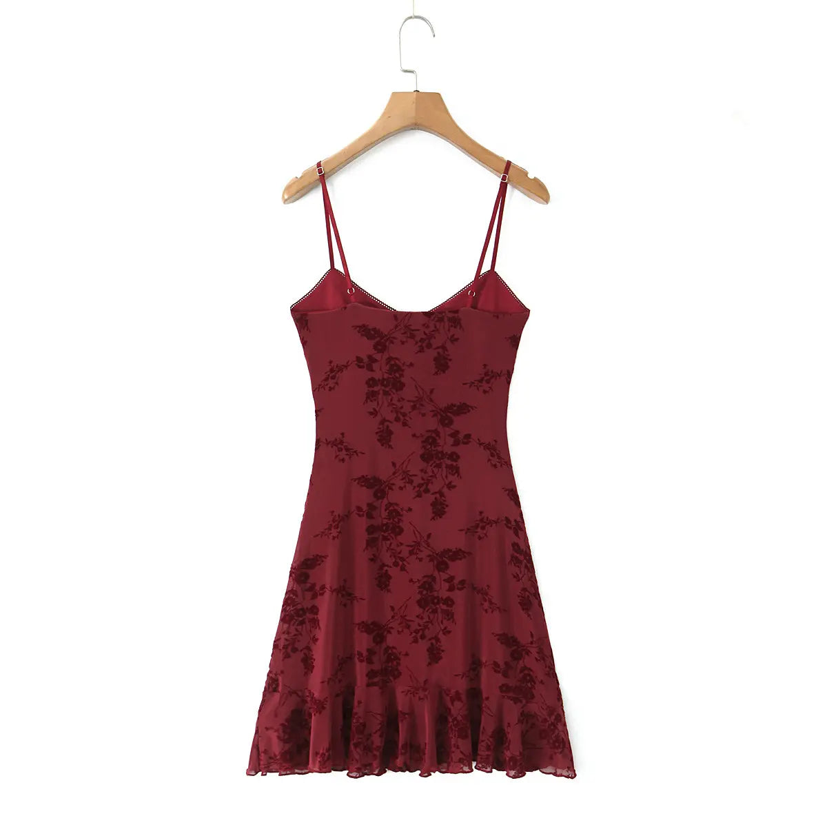 Back view of the burgundy floral cami dress on a wooden hanger, showing silhouette and print.